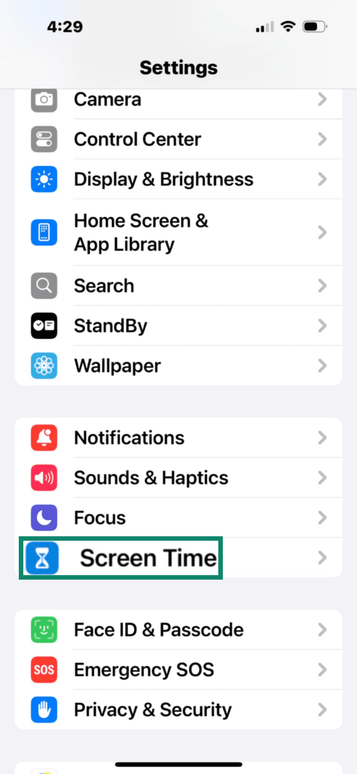 iPhone settings menu with Screen Time highlighted.