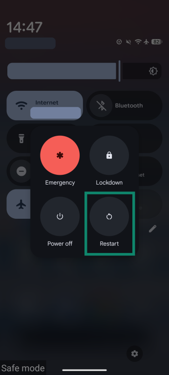 Android interface showing the power options menu and the restart option.