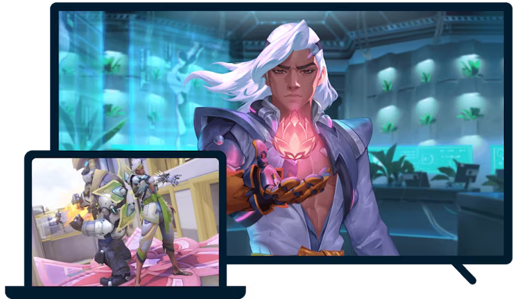 Kannettava ja televisio, joiden ruuduilta näkyy Overwatch.